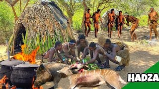 Hadza cooking and eating the antelope meat in the wild cookingmeat bushmenlife [upl. by Leibman]