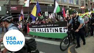 Antiwar protesters march ahead of DNC  USA TODAY [upl. by Ehling]