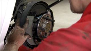 Changing Drum Brakes Step 5  Install the Anchor Spring and Leading Shoe [upl. by Adlee689]