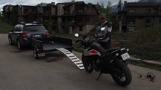 How to load a motorcycle singlehandedly onto a trailer using an electric winch in relative safety [upl. by Arret927]