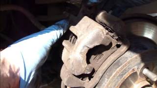 How to change rear brake pads Toyota Corolla Years 20022008 [upl. by Arihppas102]