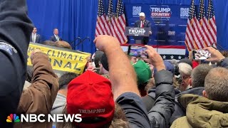 Trump Iowa event interrupted by climate protesters [upl. by Lorena958]