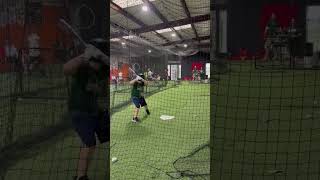 Hitting bombs against a pitching machinebaseballfunshorts [upl. by Ennaihs]