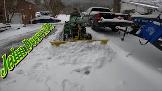 Plowing my Neighbors out in a blizzard  John Deere x570 [upl. by Ammadis]