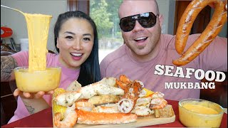 KING CRAB LOBSTER SEAFOOD BOIL  SAUSAGE CHEESE SAUCE MUKBANG LETS EAT  SASVlogs [upl. by Lehcem]