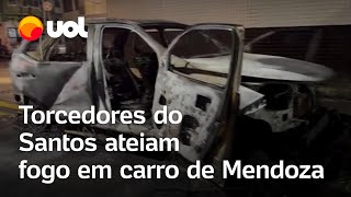 Santos rebaixado Torcedores do Santos ateiam fogo em carro de Mendoza nos arredores da Vila Belmiro [upl. by Aynotak432]