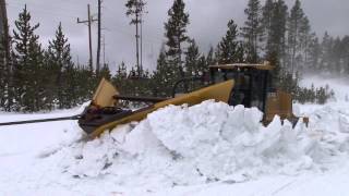 Plowing snow from roads in the spring in Yellowstone National Park [upl. by Roht]