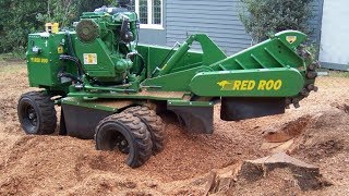 Stump Grinder big Cypress tree stumps [upl. by Tilly]