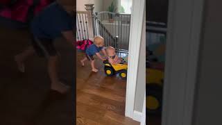 2 Year Old Pushes Baby Brother On Truck [upl. by Thomson124]