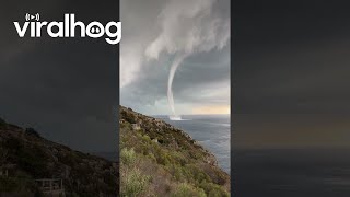 Waterspout Forms Off Italy Coast  ViralHog [upl. by Rubel]