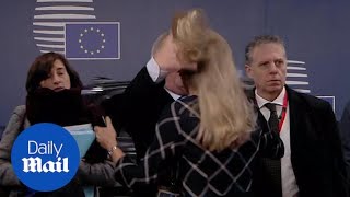 Bizarre moment JeanClaude Juncker RUFFLES WOMANS HAIR [upl. by Lyndes]