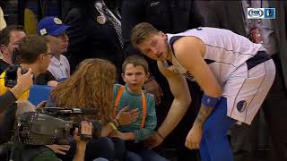 Luka Doncic autographs jersey for young fan after collision in game at Golden State [upl. by Miranda]