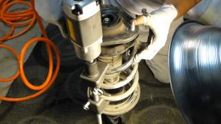 How to Replace Front Struts Shocks on Scion tC Fix Bouncy toyota Suspension Spring Compressor Tool [upl. by Diamante15]