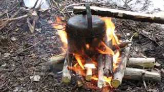 Low fire cooking style simple pot hanger amp under tarp [upl. by Yajet718]