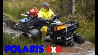 Awesome Polaris 6x6 Sportsman 500 ATV in the woods and in the mud 6 six wheeler with chains [upl. by Lihka]