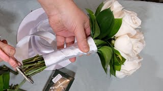 Arranging a perfect bridal bouquet with 12 roses [upl. by Aihsenek]