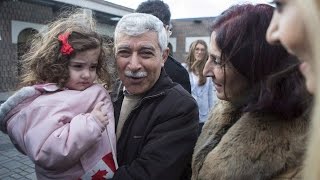 Syrian refugees have emotional family reunions in Toronto [upl. by Enirhtac928]