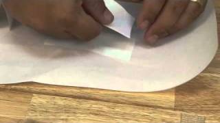 Using Dacron Sail Repair Tape or Insignia Adhesive Material for Sail Repair [upl. by Shelagh]