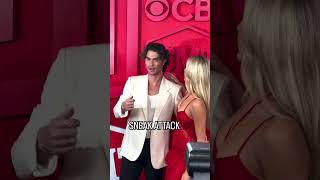 Kelsea Ballerini Gives Chase Stokes A Kiss On The CMT Music Awards Red Carpet [upl. by Annez]