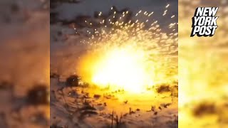 Ukrainian soldiers hit mine while inside USmade Humvee near Donetsk  AFP [upl. by Newfeld]