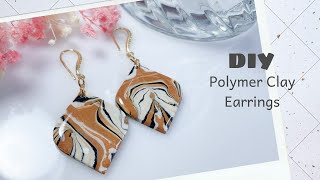 Crafting Distinctive Golden Polymer Clay Earrings  How to make polymer clay earrings  DIY [upl. by Eihpos]