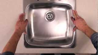 How to Install a Kitchen Sink  RONA [upl. by Ylliw]