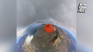 Skydiver records himself freefalling through clouds in stunning video [upl. by Noxin186]