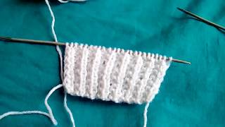 Tuto tricot  point ajouré le point de sillon Punto dos agujas stich knitting [upl. by Enytsirhc]