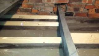 Fitting insulation and boarding a loft space with small rafters [upl. by Muldon446]