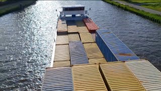 Containerschip de PRISA vaart onder de HOOGSTE BRUG van de provincie GRONINGEN door [upl. by Ettezel]