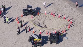 Young girl killed when a hole she dug in the sand collapsed on a Florida beach [upl. by Sherr438]