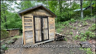 Covering a shed with palette wood [upl. by Lancelle43]