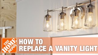 Bathroom Lighting  How to Replace a Vanity Light  The Home Depot [upl. by Chen644]