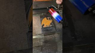 Letterpress printing a bald eagle with red white and blue ink using a Washington hand press [upl. by Adnorat]