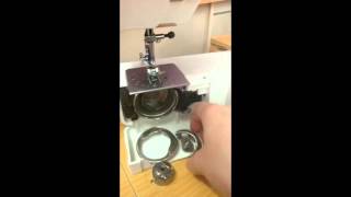 How to pull apart and reassemble the bobbin case area on a front loading sewing machine [upl. by Mandy]