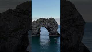 Spectacular Durdle Door at 6 am stunningdrone durdledoor views fun happy travel sun water [upl. by Silvie]