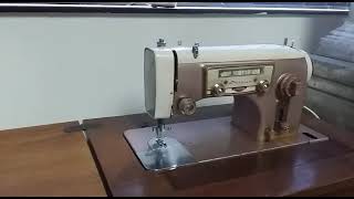 Vintage Gritzner type GU electric sewing machine in cabinet [upl. by Aikemat862]