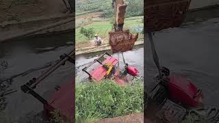 The process of salvaging an agricultural vehicle that fell into the water [upl. by Hertha]