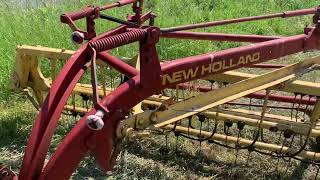 Raking Hay with New Holland 258 rake [upl. by Ribaj]