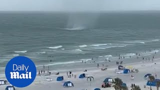 Moment brutal waterspout storm wipes out Floridas infamous Clearwater Beach [upl. by Lenz]