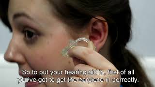 How to put in and remove an earmould hearing aid [upl. by Cirek]