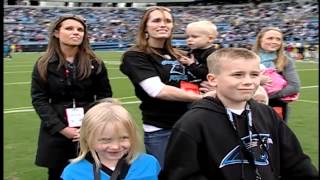 Soldier Surprises Family on field at Panthers Game [upl. by Kunkle]