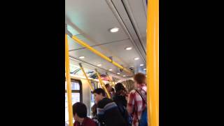 Choir singing Bohemian Rhapsody on Vancouver Skytrain [upl. by Decamp]