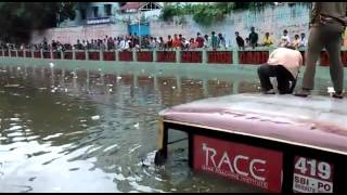 Chennai Rains Dramatic scenes of a bus that was stuck in TNagar Aranganathan subway [upl. by Llerod]