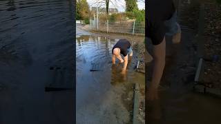 S0142 Unclogging a storm drain on a playing area in Germany shorts [upl. by Nahama]