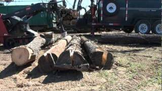 22 Using the Atom Splitter on a Toro Dingo to Split 12 foot Logs [upl. by Haelam452]