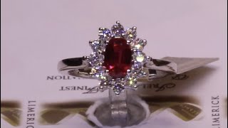 86628  R094ctD049ct  Oval Ruby and Diamond Cluster Ring  Set in 18ct White Gold [upl. by Ahsila45]