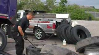 How to install a New Trailer tire on the rim with basic tools [upl. by Elga]