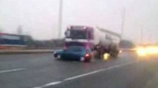 Lorry pushes car down motorway at 60mph [upl. by Llerdnam]