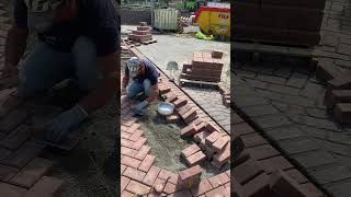 Installing bricks with masonry glue street Dordrecht netherlands on [upl. by Eitsirk]